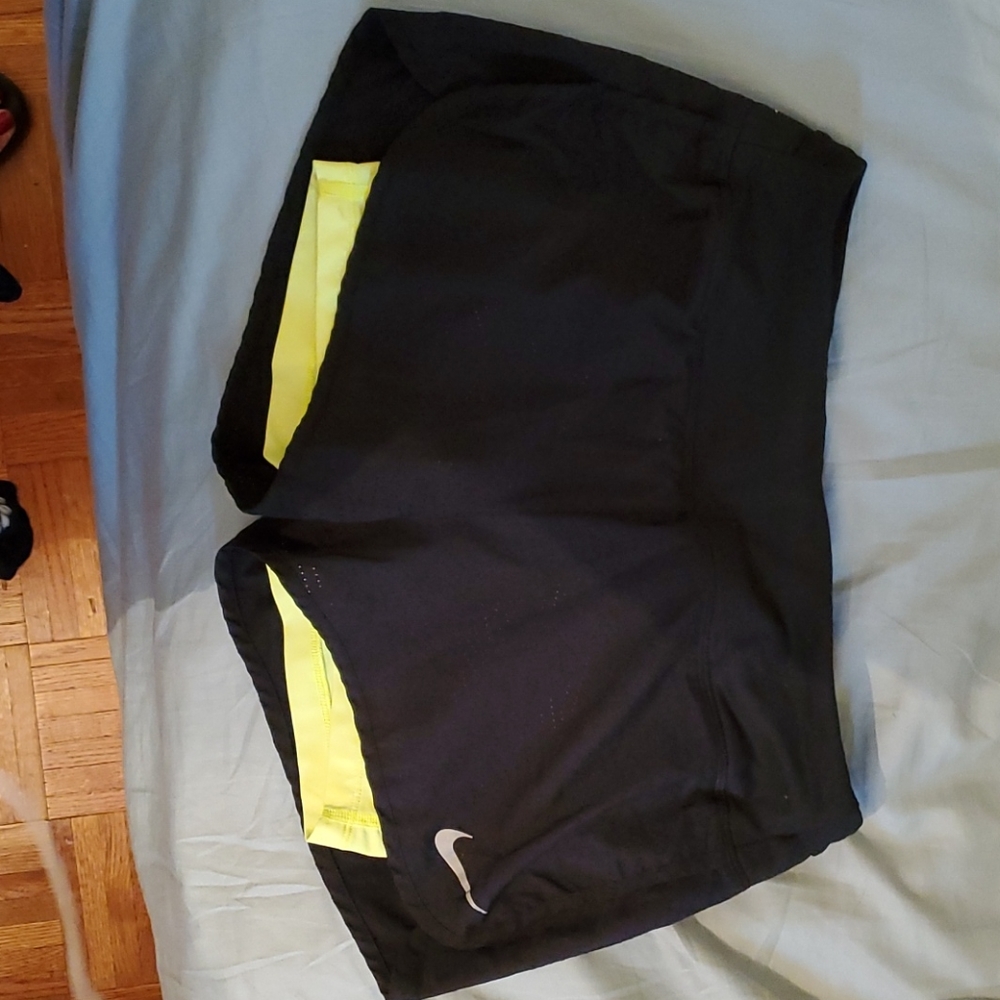 Nike running shorts black with yellow inset shorts